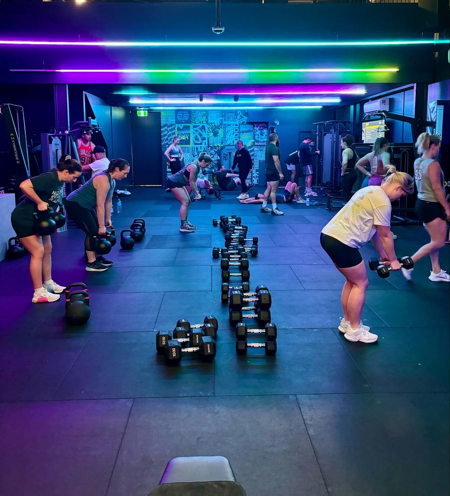 A full class training with kettlebells and dumbbells