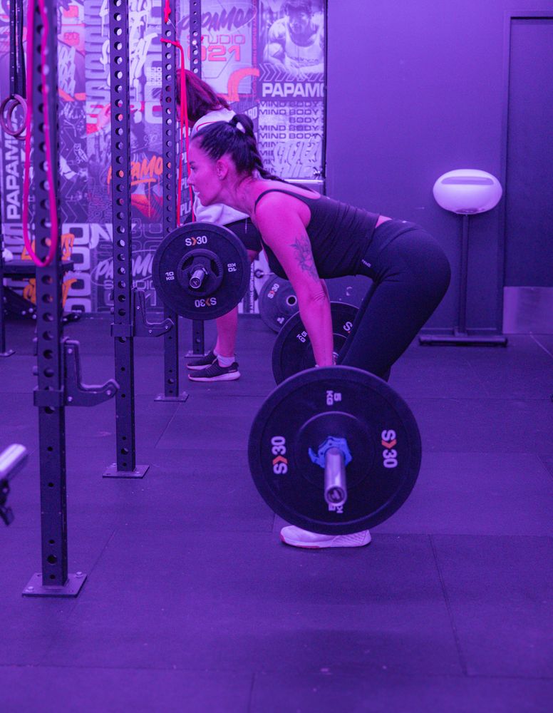 Member deadlifting with S30 plates
